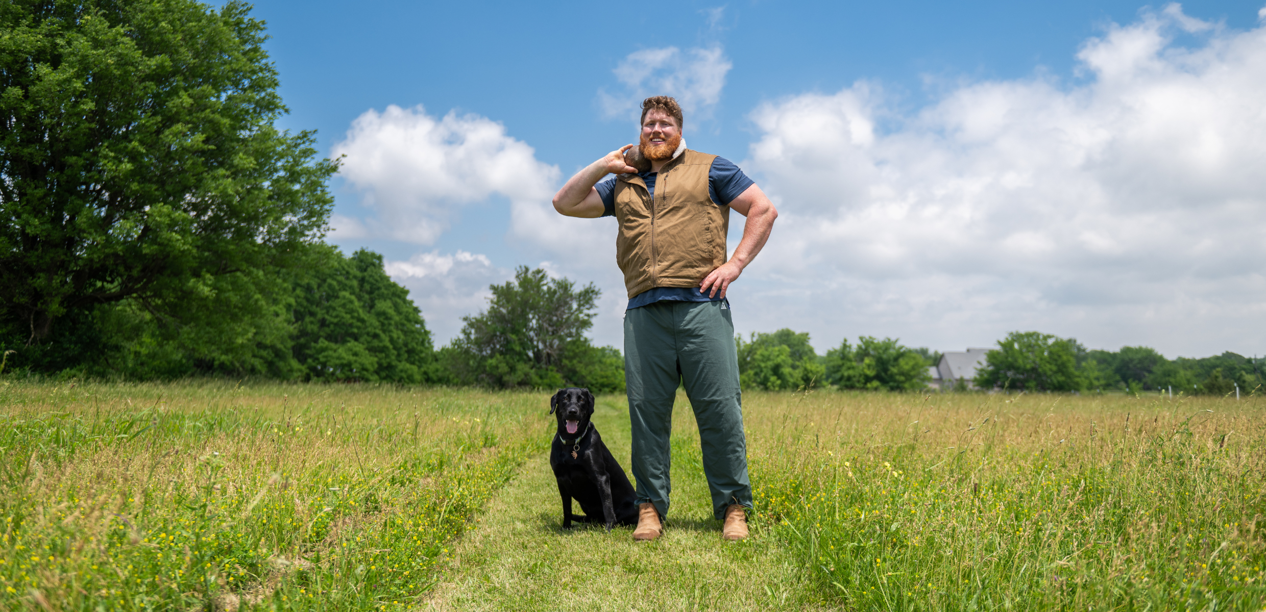 Ryan Crouser y Koda